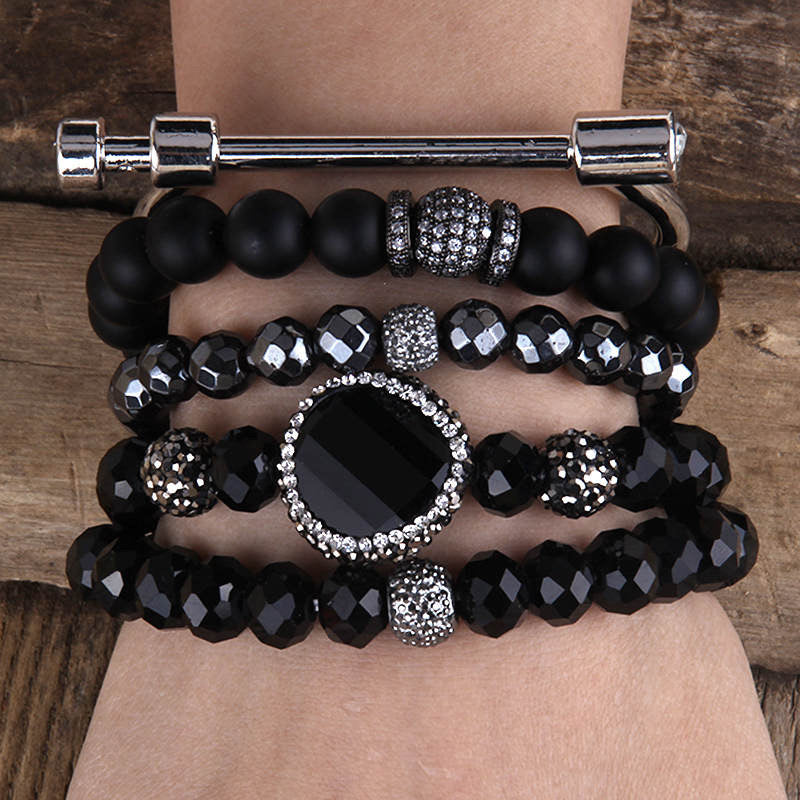 Rhinestone studded beaded bracelet set silver and black