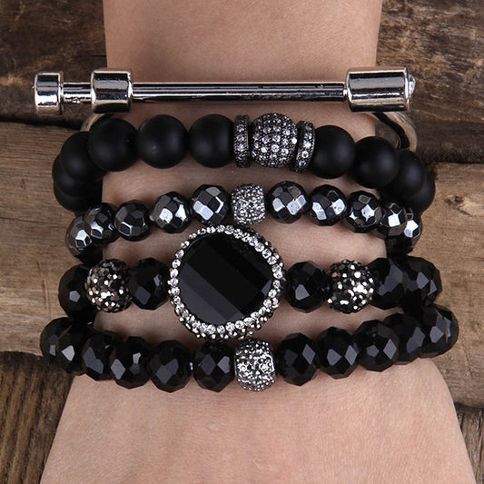 Rhinestone studded beaded bracelet set silver and black