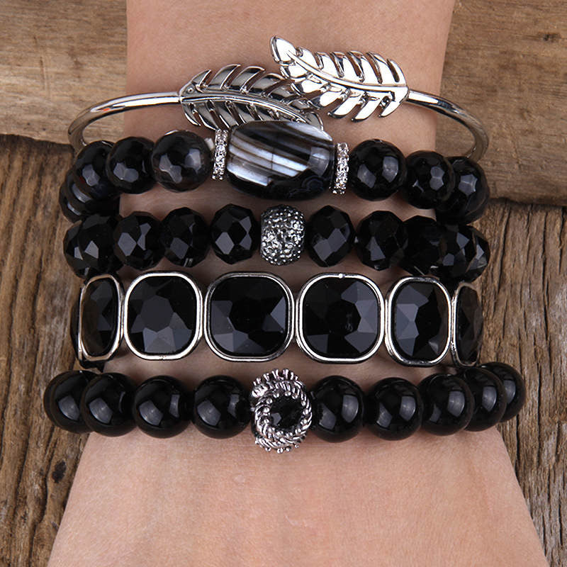 Rhinestone studded beaded bracelet set silver and black