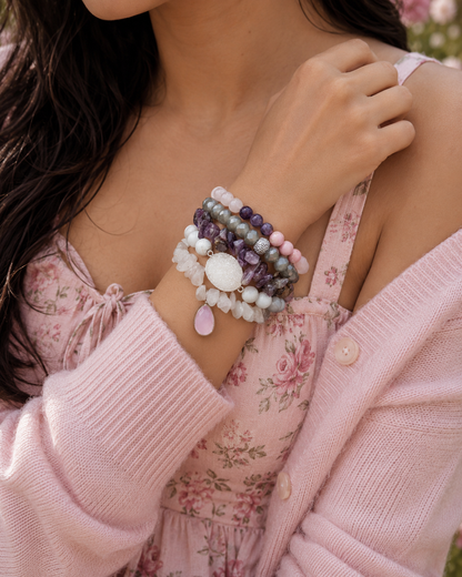 Women wearing an amethyst bracelet stack 