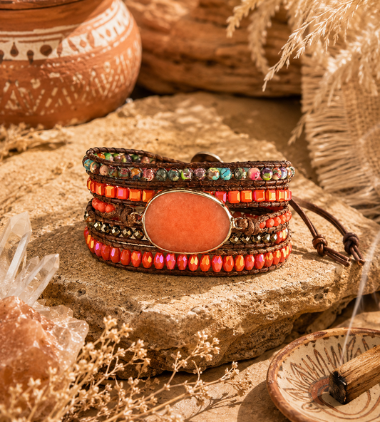Multicolored beaded bracelet on a stone surface with rustic background